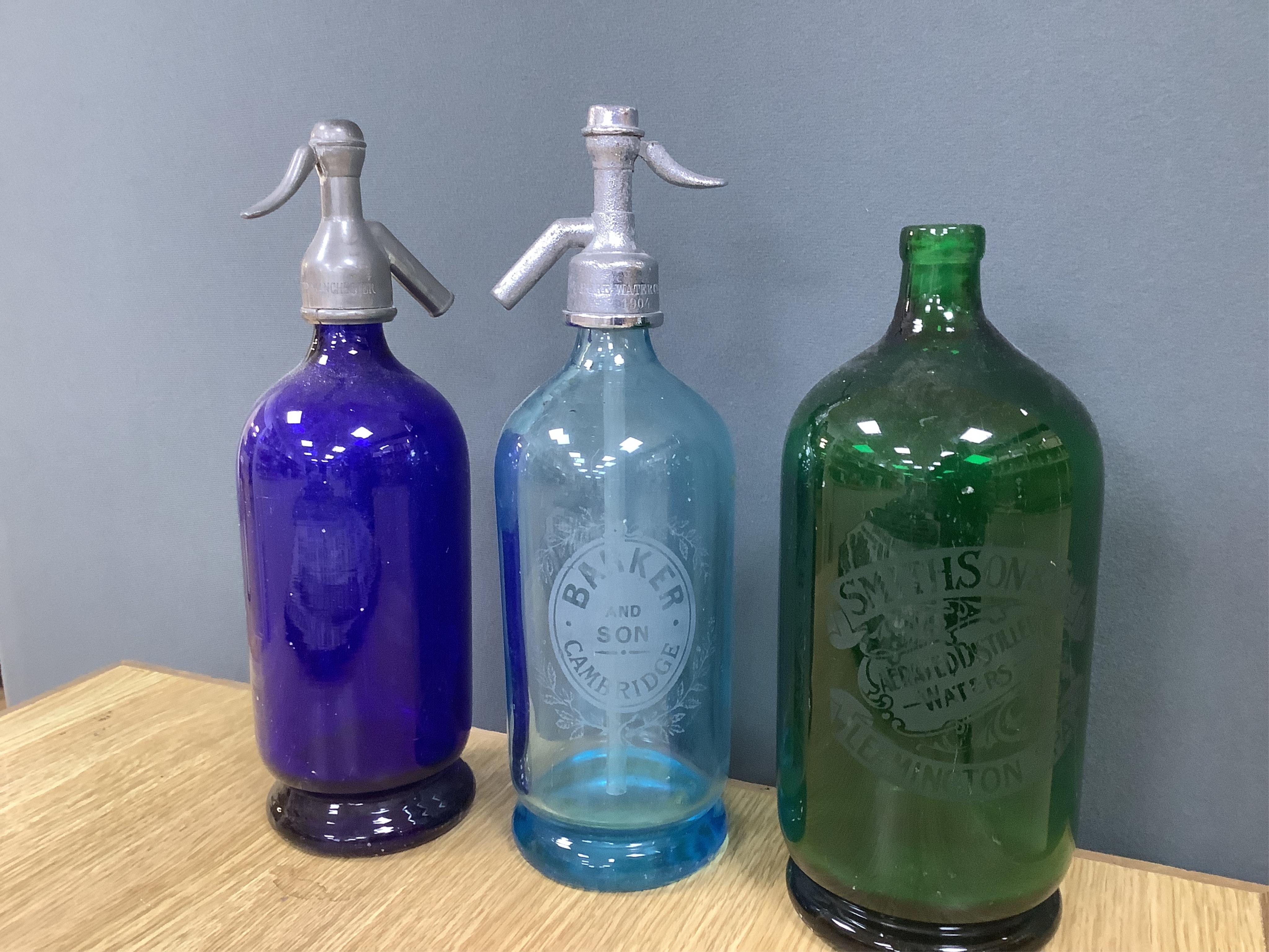 An Edwardian Standard English Seltzogenes double gourd Soda Syphon, one other and a collection of coloured glass bottles. Condition - varies